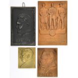 A small rectangular cast iron wall plaque, 3” x 5”, embossed with head of Goering; a similar sand