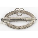 A post WWI German commemorative Army airship crew badge, of silver plated white metal, the reverse