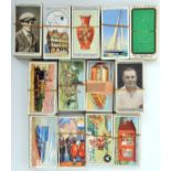 13 sets of cigarette cards by Ogdens including: Champions of 1936; Motor Races 1931; Famous Rugby