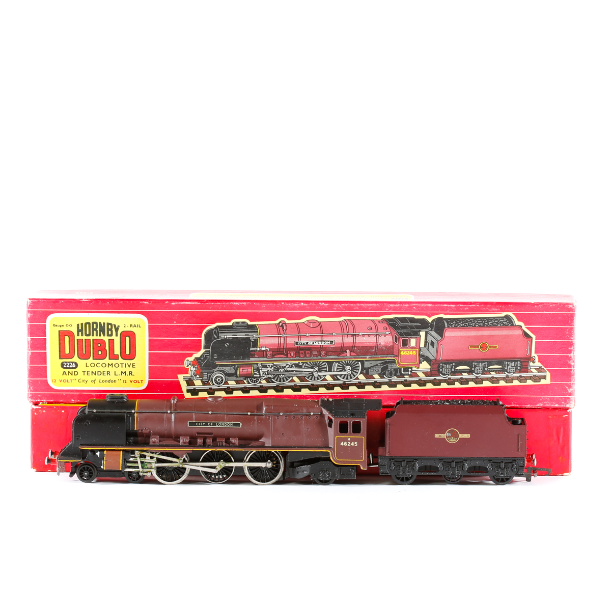 A Hornby Dublo 2-rail Locomotive and Tender, City of London (2226). In BR LMR lined maroon livery.