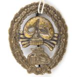 A Third Reich period Condor Legion Panzer Assault badge, of flat die struck nickel silver with