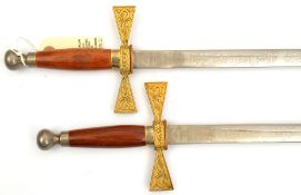 A pair of society swords, plated DE blades 30” by Wilkinson Sword, etched on one side with knight in