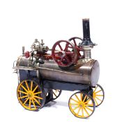 A rare Portable Stationery Engine by Bing. A live steam single cylinder slip eccentric engine with