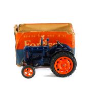 A scarce Chad Valley Fordson Major Tractor. In dark blue with orange wheels fitted with rubber