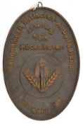 A Third Reich oval bronzed cast iron wall plaque, 9” x 6”, embossed with RAD device and “Abteilung