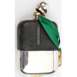 An unusually large late 19th century safety “hip” flask, leather covered upper section with