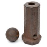 An old cast iron signal or pyrotechnics mortar, 9” overall with 1¼” bore, of octagonal section