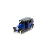 A rare Dinky Toys Taxi (36g). An example in violet blue and black with open rear window, black