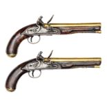 A brace of flintlock mail coach pistols comprising: a scarce 16 bore brass barrelled flintlock