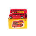 Dinky Toys London Bus. A rare late example in red with 'Exide BATTERIES' and 'Corporation Transport'