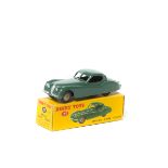 Dinky Toys Jaguar XK120 (157). Example in dark sage green with fawn wheels with black rubber