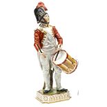 A French painted porcelain figure “Garde d’Honneur de Lyon”, in full dress with bicorne hat and side