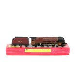 A Hornby Dublo 2-rail Locomotive and Tender, City of London (2226). In BR LMR lined maroon livery