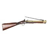 A good quality brass barrelled flintlock blunderbuss with spring bayonet, by J & W Richards, c 1810,