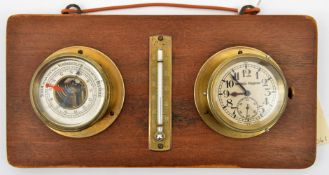 A German made set of brass cased clock, barometer and thermometer, the first marked “Deutsche