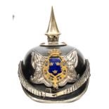 A Swedish officer’s pickelhaube style helmet, black leather skull and peaks, silver plated peak