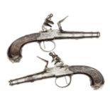 A pair of silver mounted 50 bore cannon barrelled flintlock boxlock pocket pistols, by (John)