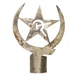 A Spanish Civil War Communist Brigade banner top, of nickel plated sheet brass, in the form of a