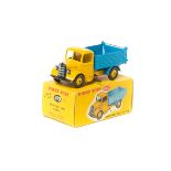 Dinky Toys Bedford End Tipper (410). A scarce example in bright yellow with mid blue rear tipping