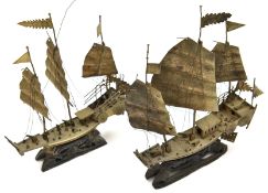 2 Chinese white metal models of “private” junks, with three masts and sails, deck house, 4 deck
