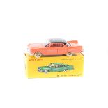 French Dinky Toys De Soto Diplomat (545). In salmon pink with black roof, with ridged plated