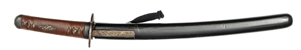 A Japanese sword wakizashi, unsigned blade 15¼” c 1600. Soft metal fuchi kashira and kurikata