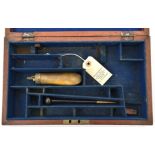 A mid 19th century blue velvet lined fitted mahogany case for an 11” percussion revolver, 12½” x 7½”