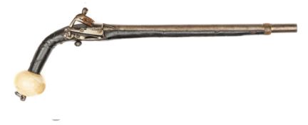 An early 19th century 24 bore Caucasian miquelet flintlock pistol, 20” overall, slender barrel