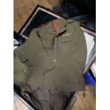 A WWII uniform of a Captain, Intelligence Corps, including khaki SD tunic, with all insignia and
