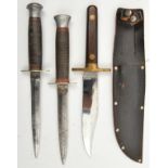 A Bowie knife, 5¾” blade marked “Bowie Knife William Rodgers England”, brass mounted rosewood