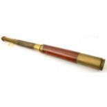 A 19th century 3 draw brass telescope, marked “Wilson London, Day or Night”, anti glare extension