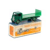 Dinky Supertoys Guy Flat Truck with tailboard (513). An example with dark green cab, chassis and