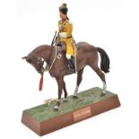 A mounted metal figure of an officer 1st Skinners Horse, by Sentry Box, 8” x 9”, on a titled metal