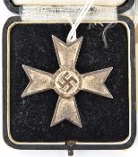 A Third Reich War Merit Cross 1st class without swords, GC (plating worn), in its original fitted
