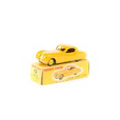 Dinky Toys Jaguar XK120 Coupe (157). In deep yellow with lighter yellow wheels and black rubber