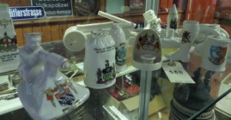 15 pieces of crested china, including Swan China WWI tank arms of Babbacombe, Clifton China warship,