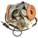 An RAF lightweight grey fabric tropical flying helmet type 22C,d 1954 with earphones and goggles,