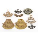7 brass shoulder titles: T/RFA/Sussex, pair T/RFA/Home Counties, 1/24/County of London, Guernsey and
