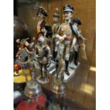 3 Continental painted porcelain figures of early 19th century naval officer, dragoon and hussar,