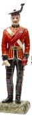 A “Kingsman Collection” painted porcelain figure “Officer K.O.S.B, c 1912” standing at ease, in full