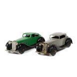 2 Dinky Toys 36 series. Humber Vogue (36c) in grey with black chassis and black ridged wheels.