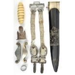 A small quantity of Third Reich dagger parts, comprising 1933 model SS sheath (chape missing), 2 x