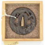 A Japanese tsuba, in the form of a dragon. GC
