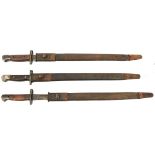 3 P1907 bayonets, various stamps at forte, in scabbards (one AF). Generally GC (some wear)