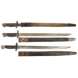 3 P1907 bayonets, various stamps at forte, in scabbards. Generally GC (some wear).