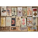 30 sets of cigarette cards including: Famous Boys, Lawn Tennis, Steamships, Military Headdress,