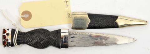 A modern skean dhu, plated blade 3½”, darkwood strapwork grip, top with glass “citrine”, plain