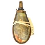A late 18th century horn powder flask, brass edge bound with rounded outer, and flat inner, sides,