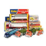 9 Dinky Toys. A Bedford TK Refuse Wagon (978) in metallic green with light grey rear tipping body,