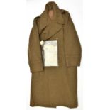A WWII Majors khaki “Great Coat. Battle Dress”, maker’s label d 1943, “King David Hotel Jerusalem”